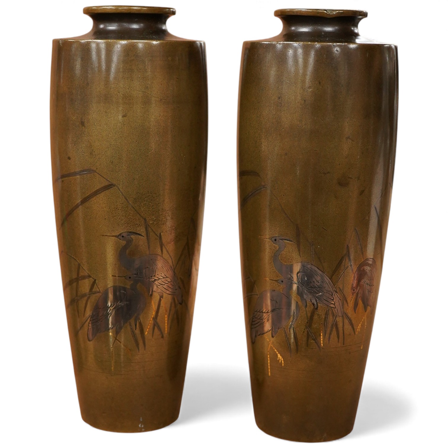 A pair of Japanese Meiji period bronze vases with crane decoration, 15cm high